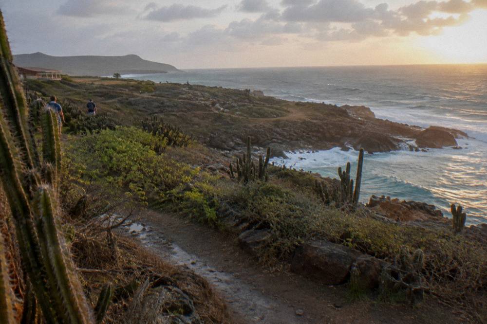 Early morning light over dry hills and the distant Caribbean coastline